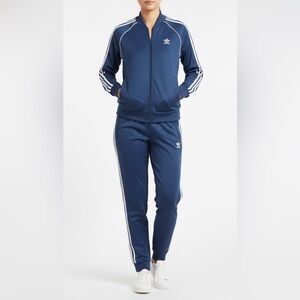 Adidas two piece jogger set. Top S 
Bottoms M. Worn once. Excellent condition.